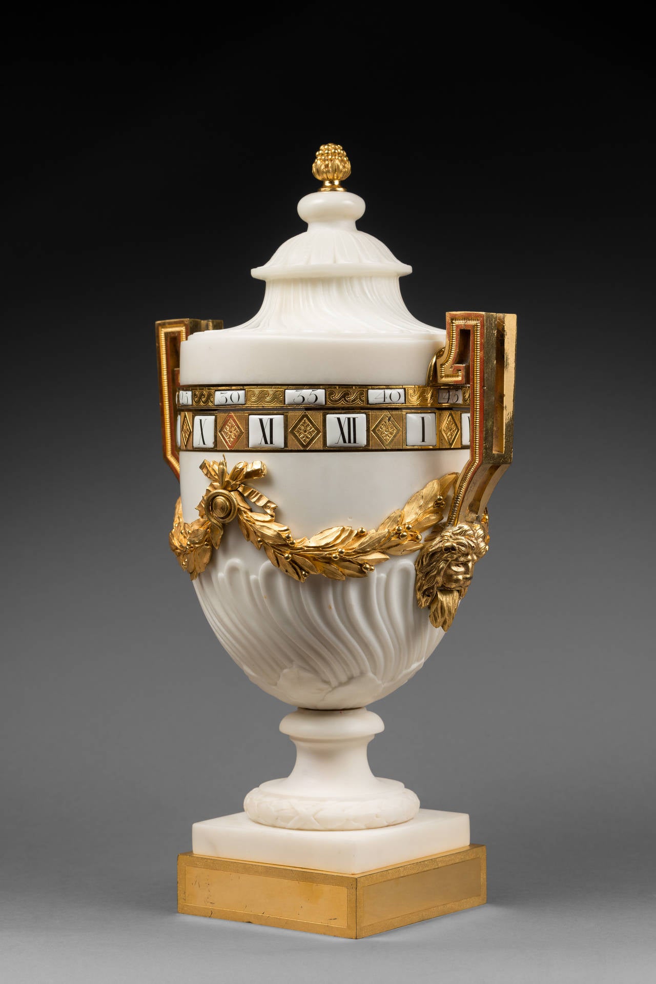 Gilt “Cercles Tournants” Louis XVI Mantel Clock, Bronze Attributed to Gouthière For Sale