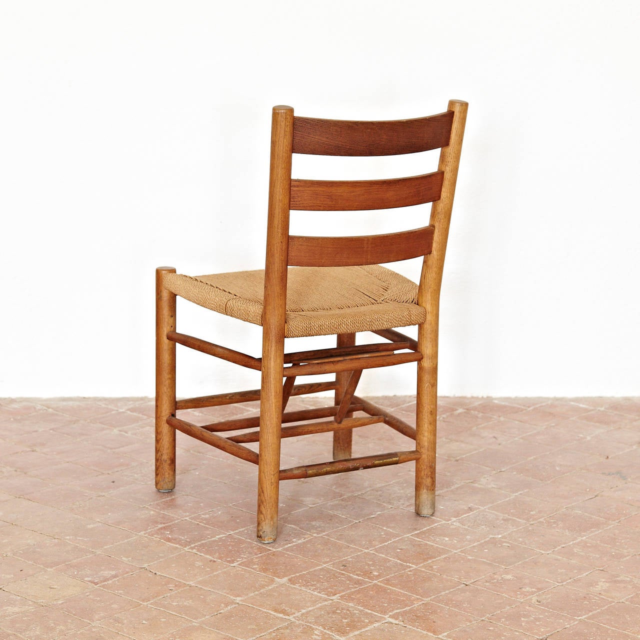 Kaare Klint set of 12 chairs for Grundtvig's Church, designed by Kaare Klint Manufactured in Denmark

Oak Frame and seagrass seat

In good original condition, with minor wear consitent with age and use, preseving a nice patina.

Kaare Klint