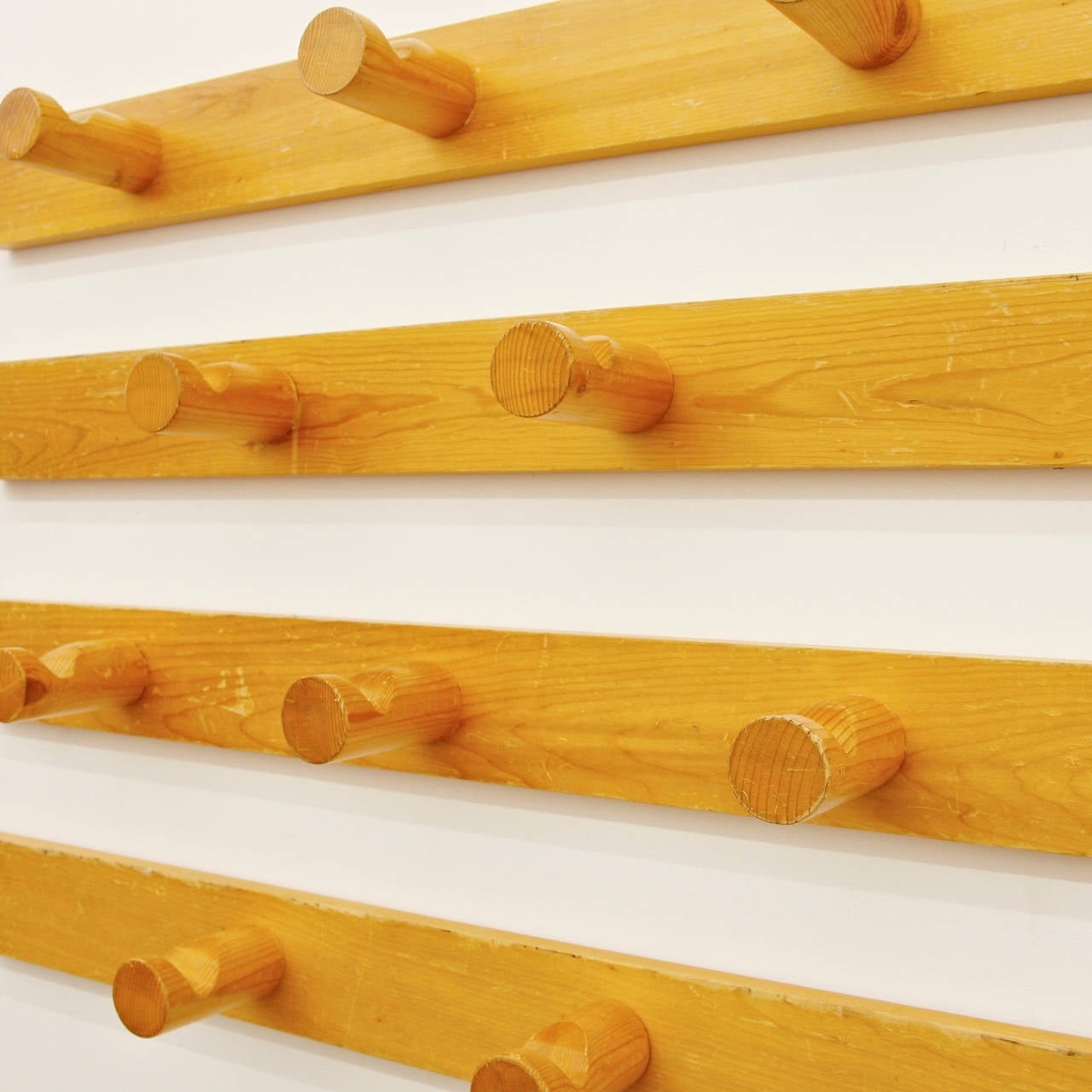 Coat Rack designed by Charlotte Perriand for Les Arcs ski Resort around 1960, manufactured in France.
Pine wood.

In good original condition, with minor wear consistent with age and use, preserving a beautiful patina.

Charlotte Perriand (1903