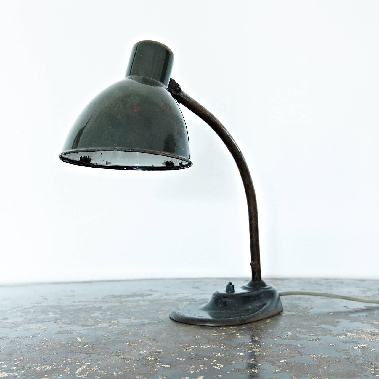Table lamp, model Kandem, designed by Marianne Brandt around 1930, manofactured in Germany.

In good original condition, with minor wear consistent with age and use, preserving a beautiful patina.

Marianne Brandt (1 October 1893 – 18 June