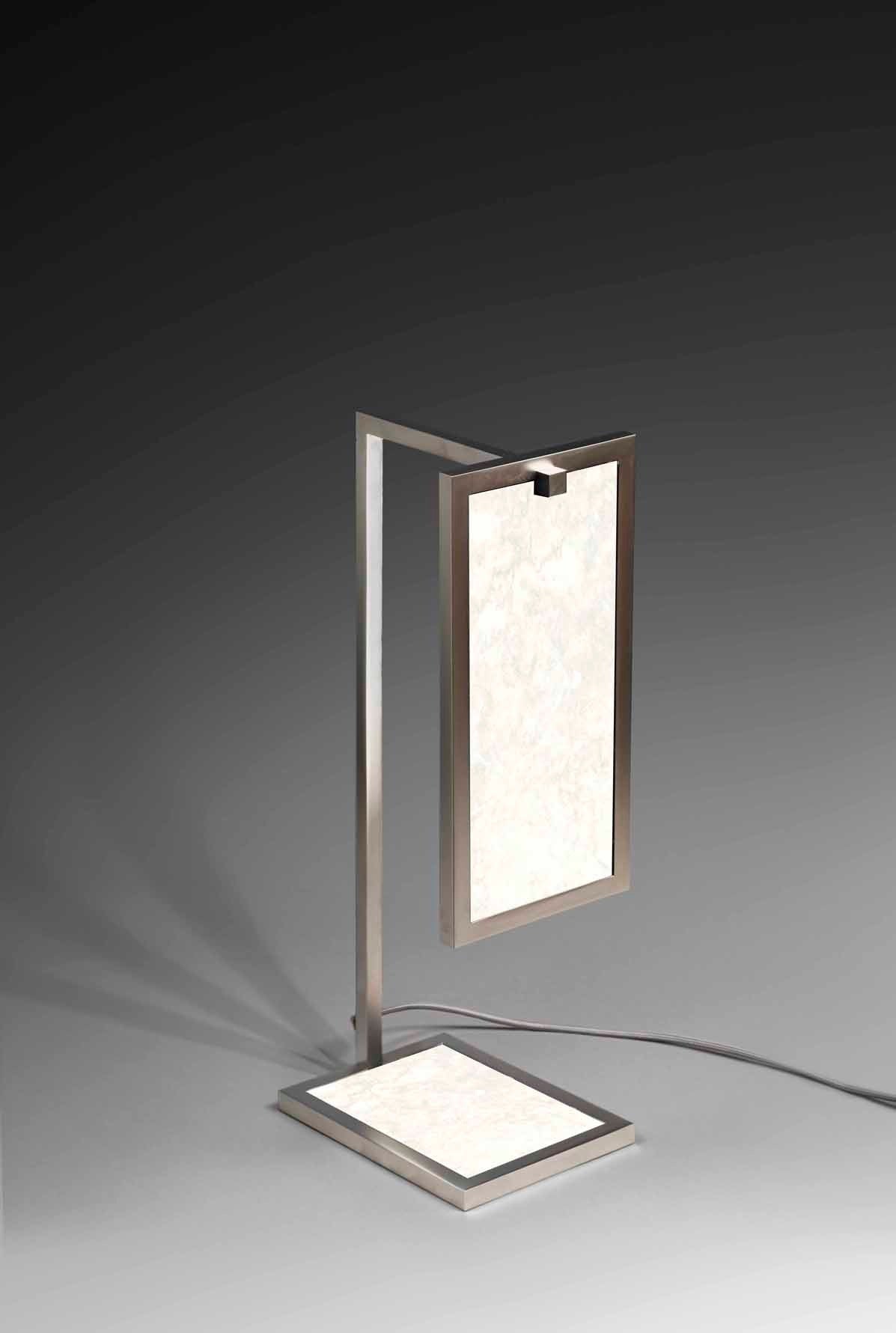 Lamp, brass structure, warm grey shade, matt nickel finish, 4 mm thickness soft Namibia marble on the base and the screen, 3 lines of led, transformator included.
Renewed according to norm US on request.
Light temperature 2700 degrées