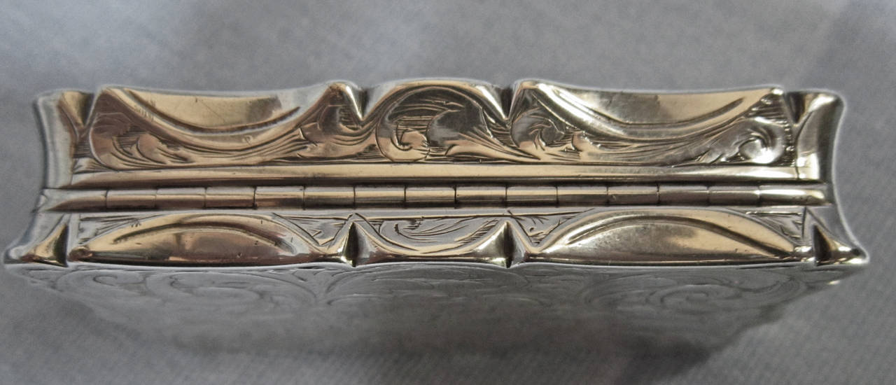 This lovely little snuff box is market for Birmingham, dated for 1845-46 and has the Y & W for Yapp & Woodward.  This measures 7.5 x 4.5 x 1.4 cm.
Has the monogram 