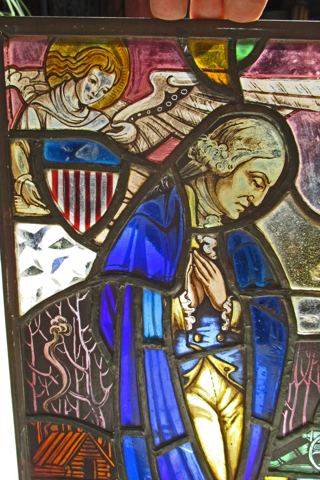 This stained glass panel depicts the historically undocumented event 