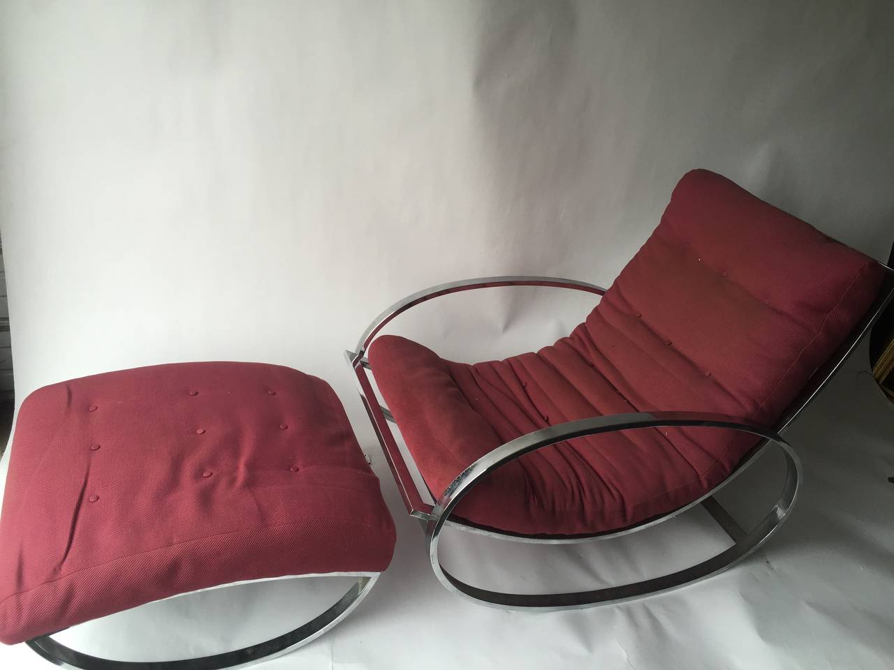 A Iconic Design chair and ottoman by Milo Baughman circa 1970's in the original upholstery.