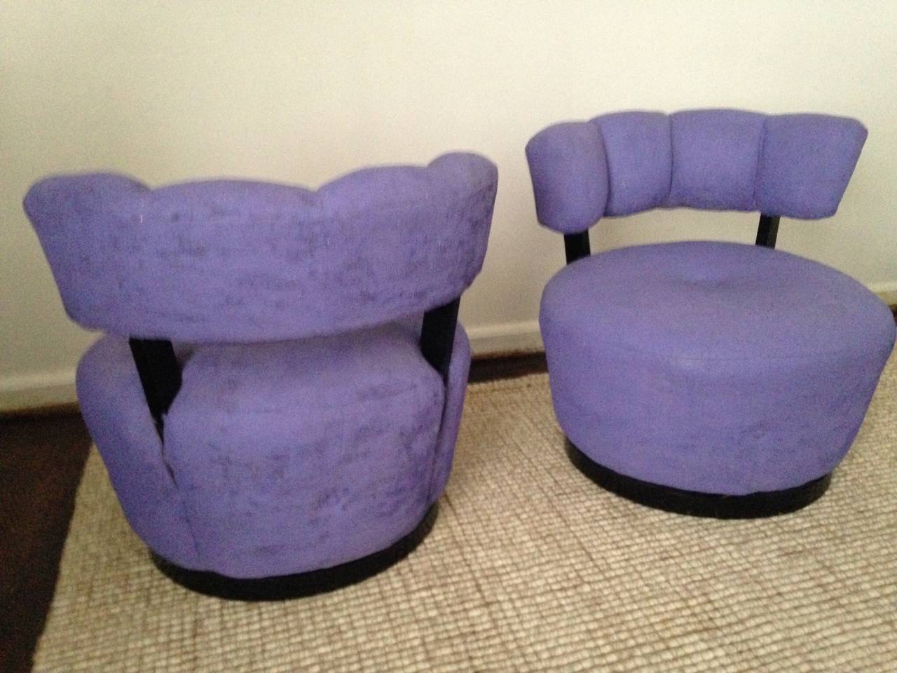 This pair of lacquered wood and suede swivel
Chairs are designed by Gilbert Rohde circa 1940's .They are a great design and recommend reupholstery.