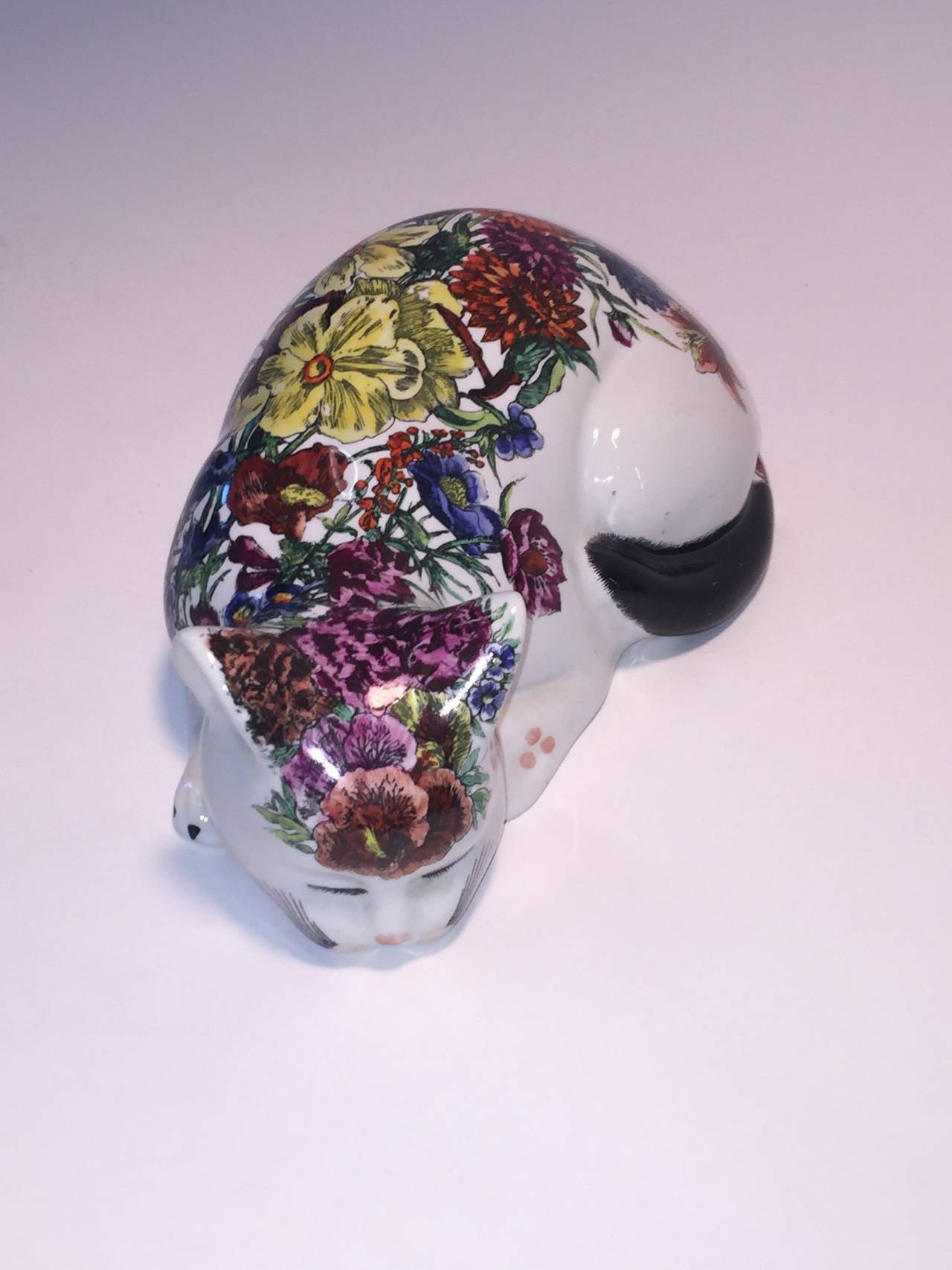 Brightly pop art floral decorated ceramic cat designed by Italian master Fornasetti. This feline has all the bells and whistles associated with his work. Designed circa 1950s in excellent condition she is a really pretty cat.