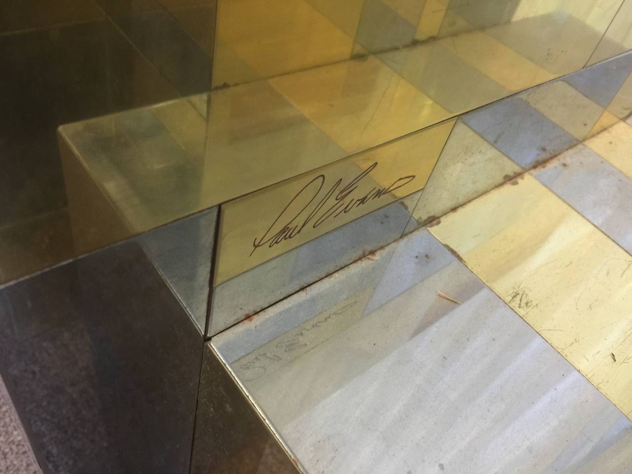 Here is a two tone cityscape console / dining table base designed and signed Paul Evans.In need of extensive restoration involving fixing bent and dented brass and chromed steel pieces and fabricating new pieces for the at least 10 that are missing