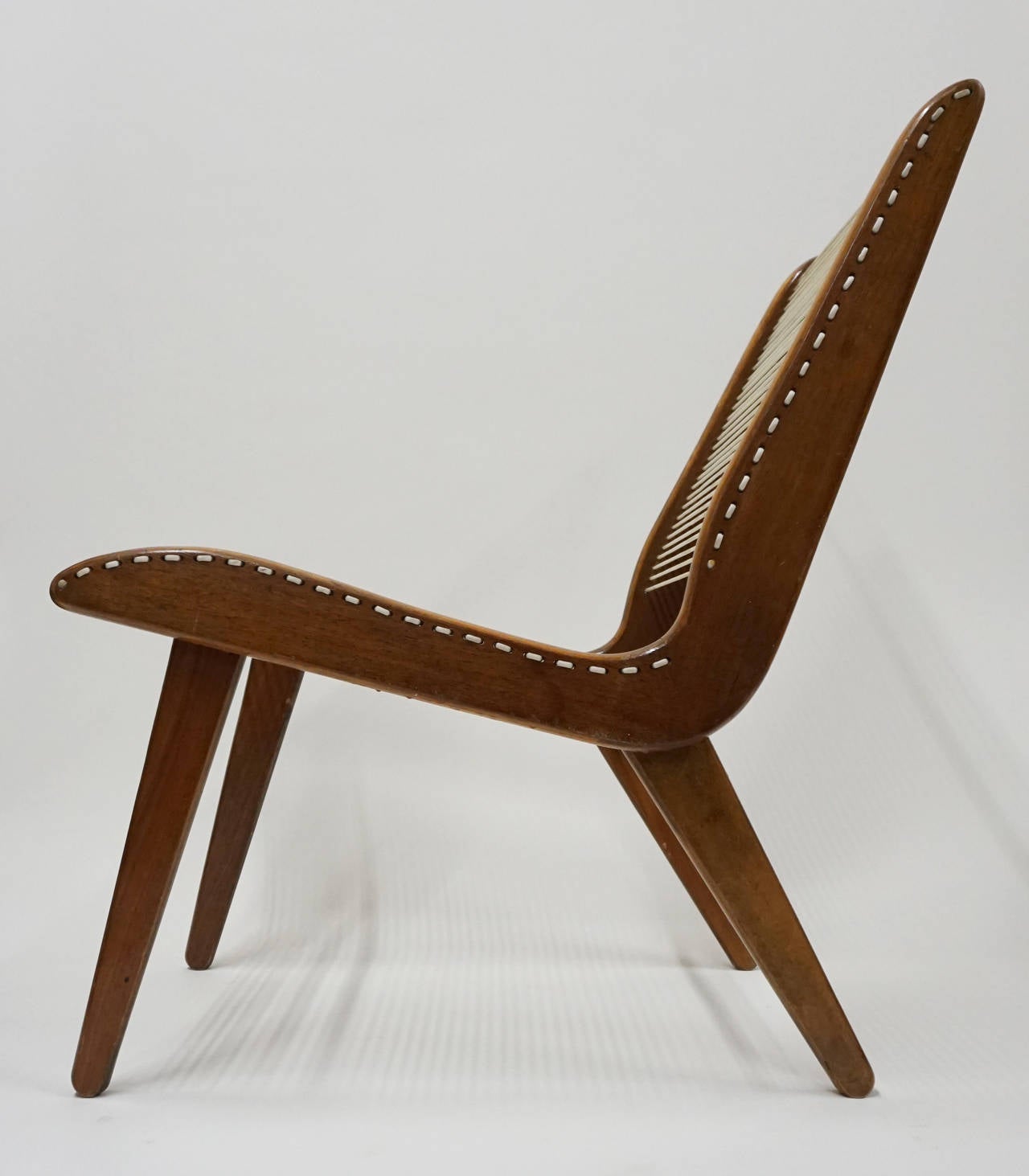 Modernist string chair by Carl Koch for Tubbs of Vermont. Great Minimalist design by the Bostson architect. Simple wood frame, nylon cord and iron supports.