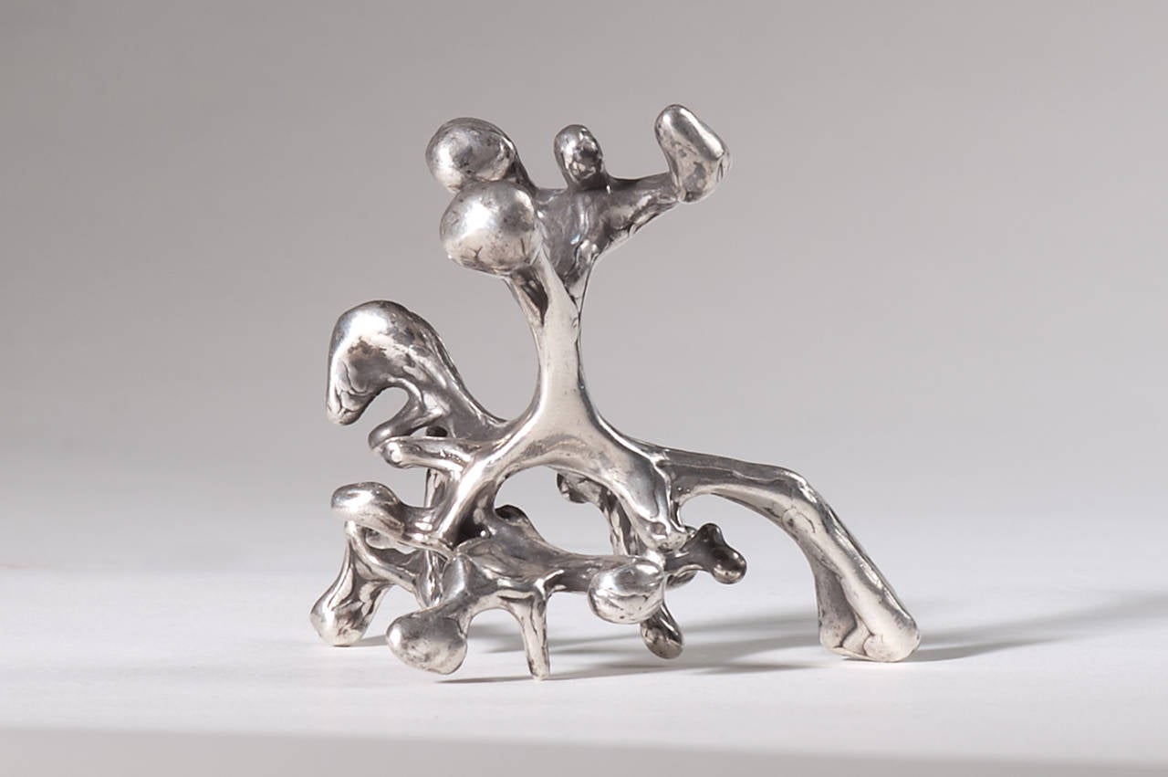 A very fine cast silver sculpture in Winston's distinctive organic style, with his subtle ridges and folds worked in the original wax adding texture and layers of detail. Made with Winston's lost wax technique after it had been refined over time,