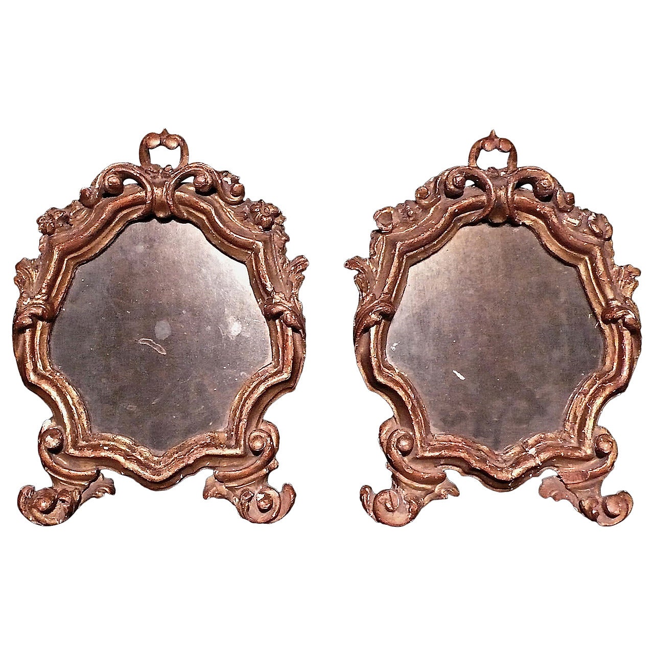 Pair of Carved and Gilded Wood Shield Shaped Mirrors
