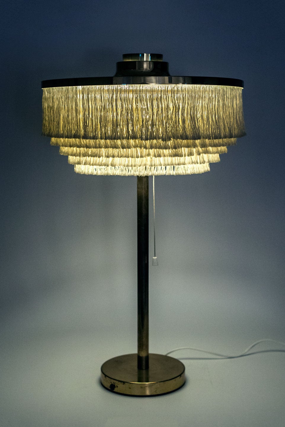 Large table lamp designed by Hans-Agne Jakobsson for Hans-Agne Jakobsson AB Markaryd, made in Sweden circa 1965-66. Silk fringes and brass.