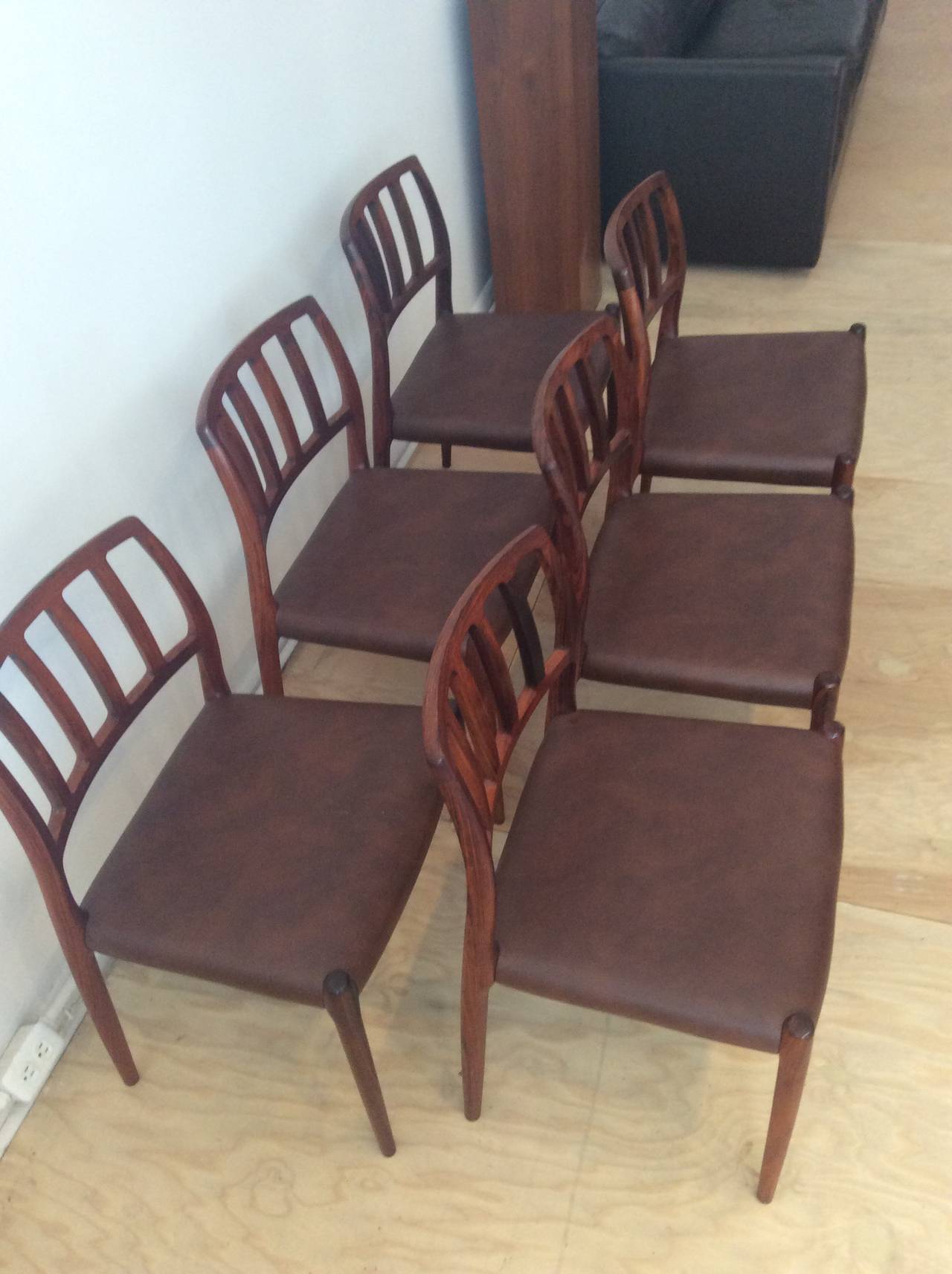 Leather Six Rosewood N.O. Møller Dining Chairs, Model 83 For Sale