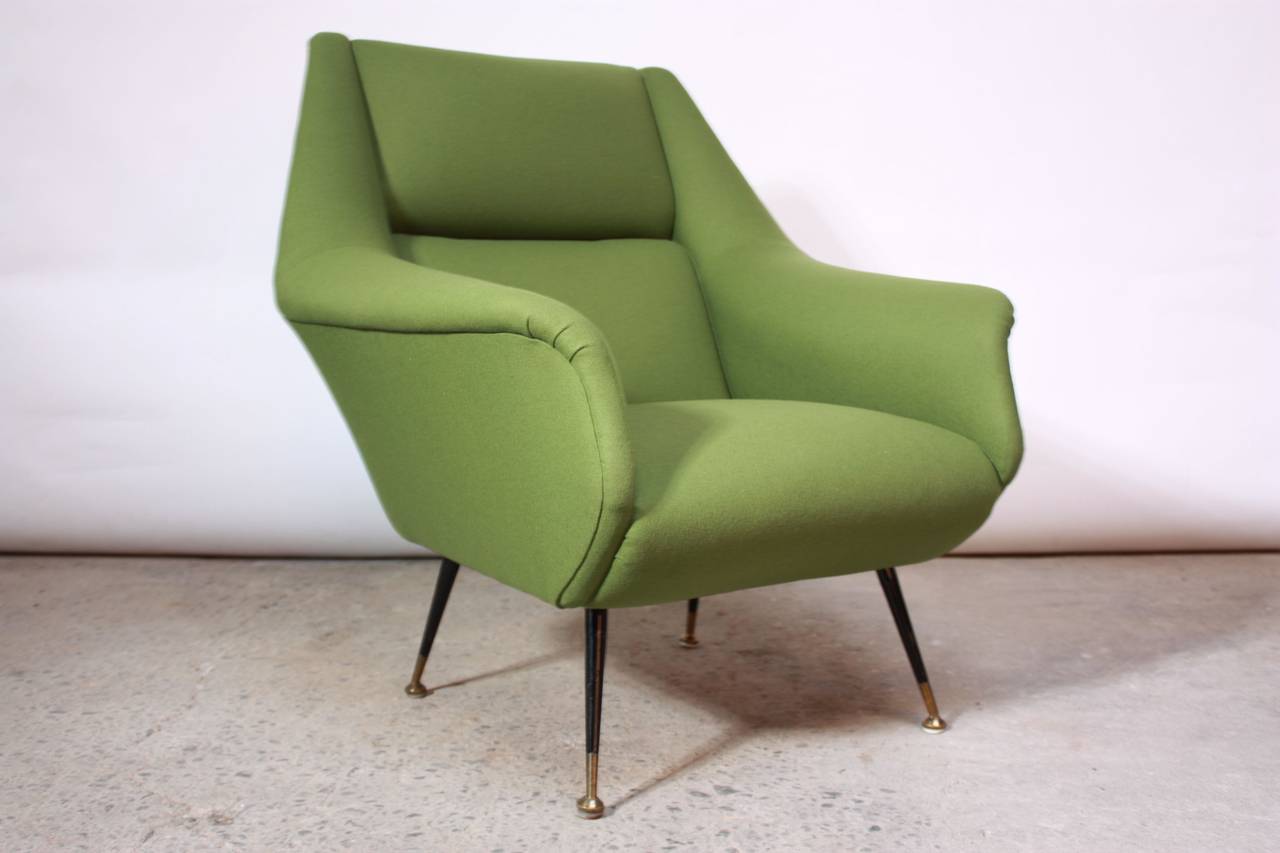 This 1950s Italian lounge chair has been recovered in a 'Grasshopper-Green' wool upholstery. Identical examples have been sold with the certificate of verification from the Gio Ponti Archive and sold as Ponti. The legs are original painted black