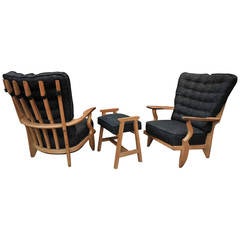 Pair of Guillerme and Chambron Lounge Oak Chairs and Ottomans for Votre Maison