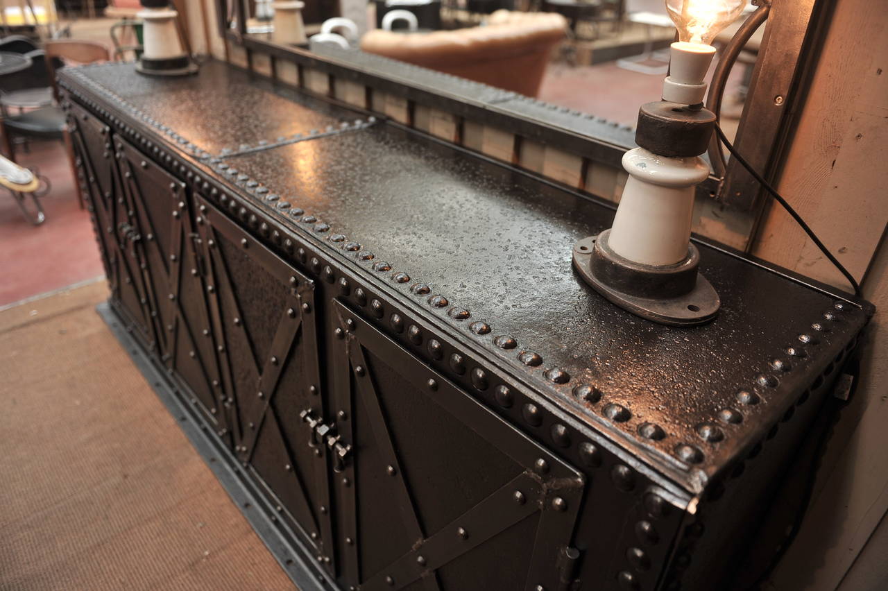 1900 Riveted Iron French Textile Factory Trunk with 4 Doors and inside shelves  remaid with Vintage base and Oak.Complete hand polish finish.
