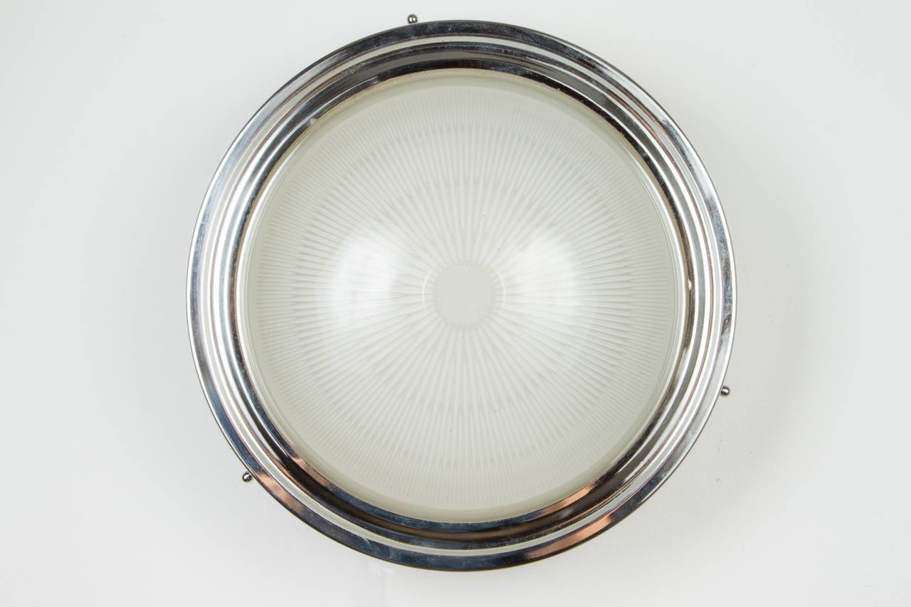 1960s Sergio Mazza ceiling or wall light for Artemide. A Minimalist Italian design executed in chrome, white painted metal and pressed glass.