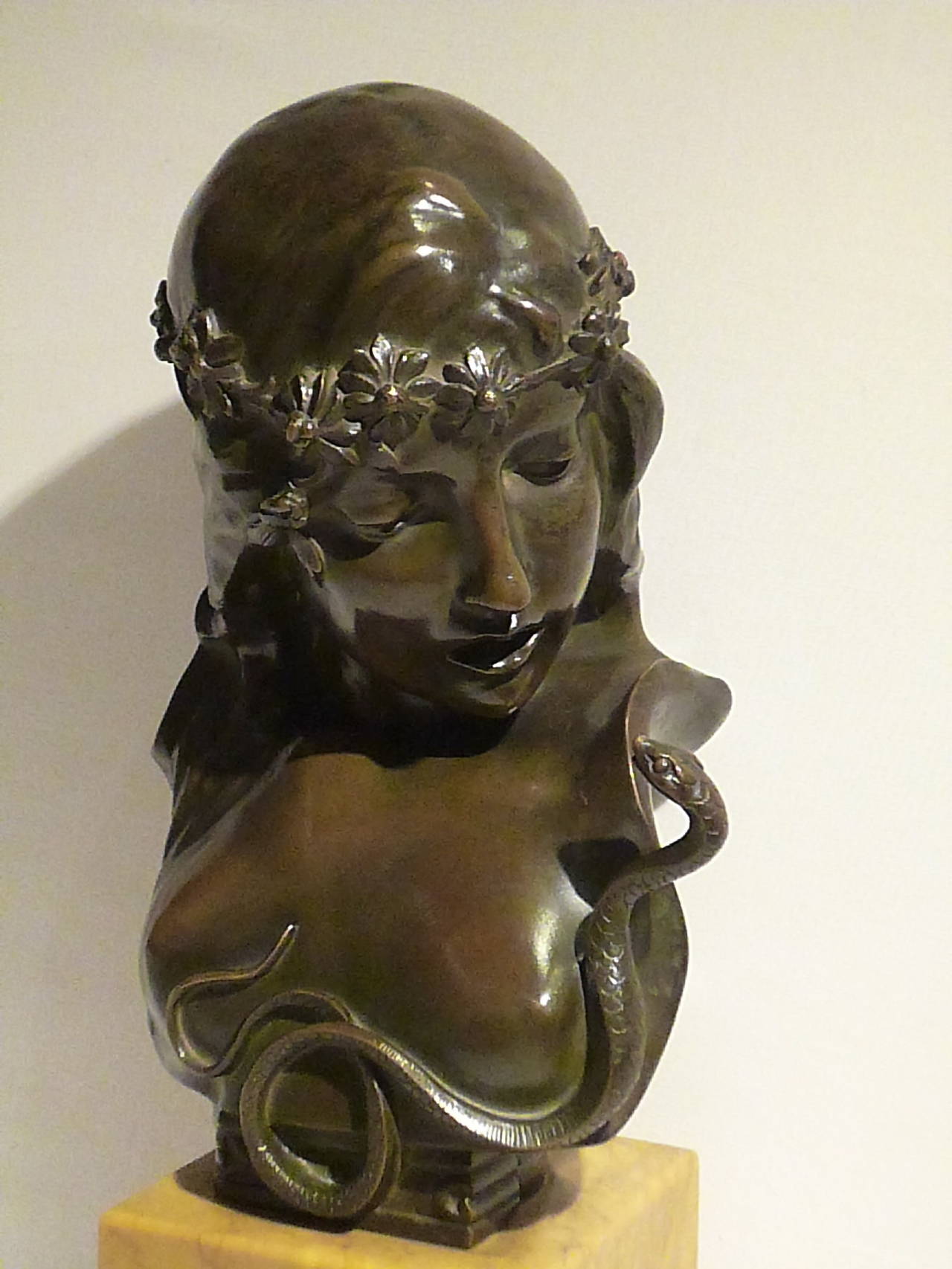 Isodore De Rudder.
Cast by H. Luppens & Cie.
"Salomé Au Serpent."
A rare Art Nouveau sculpture.
Bronze with a dark brown patina, the base in marble.
Signed with foundry mark.