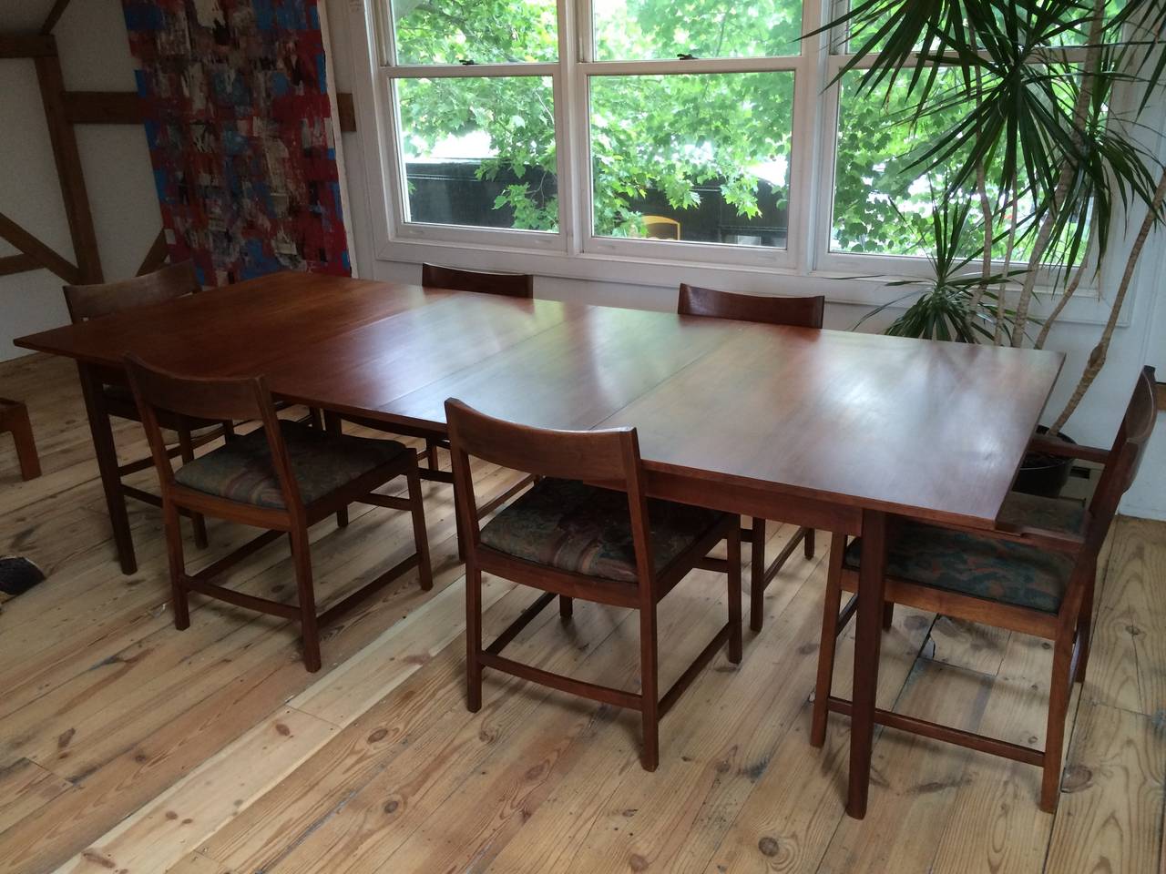 Extra wide Walnut dining table with two leaves and the six walnut dining chairs. We left the original fabric in place as it is pretty groovy.