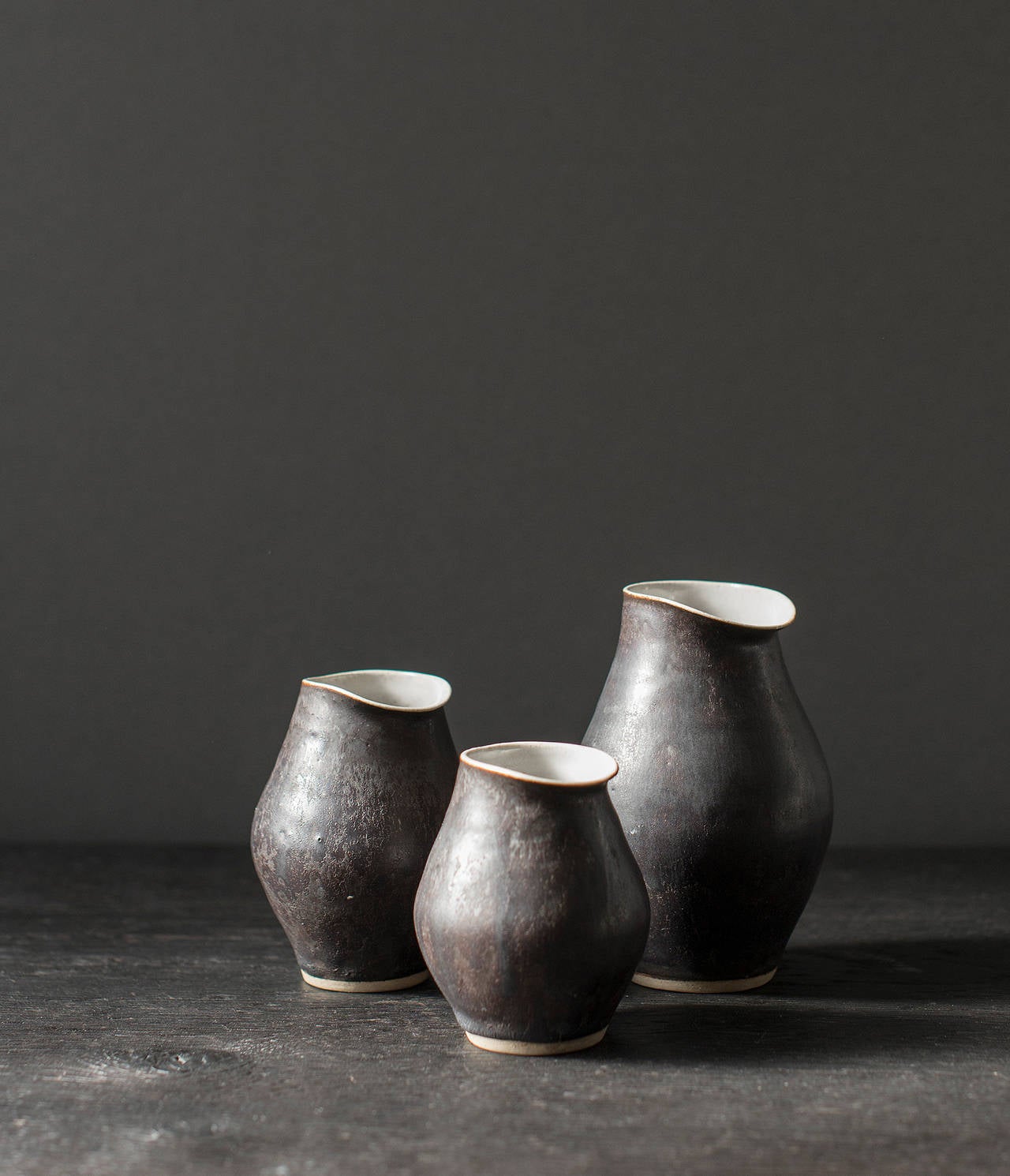 Great Britain (UK) Set of Three Black Jugs by Dame Lucie Rie