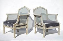 Caned Lounge Chairs by A.H. Davenport