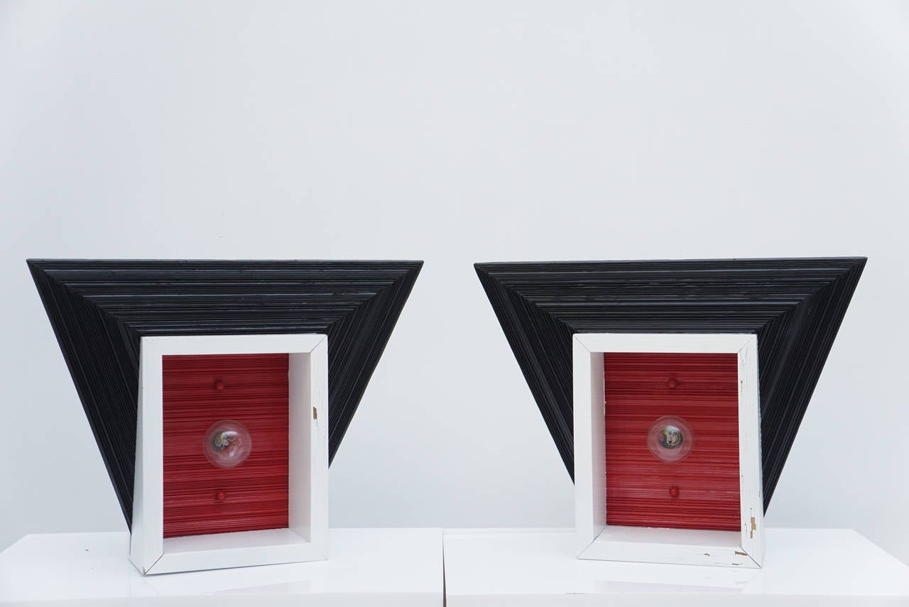 Pair, 1950's wall sconces in red, black white painted wood.
