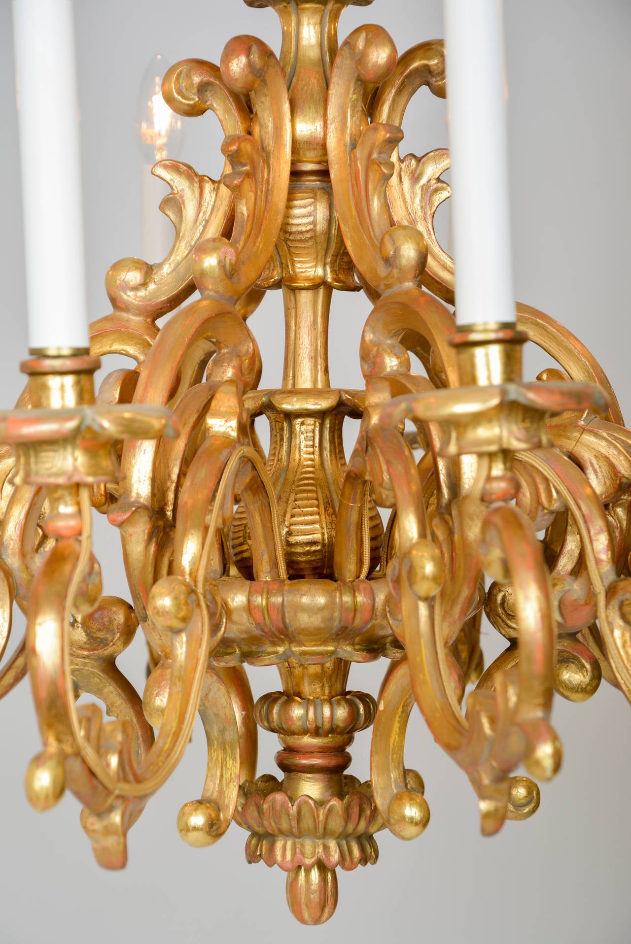 Carved Baroque Style Twelve-Light Giltwood Chandelier For Sale