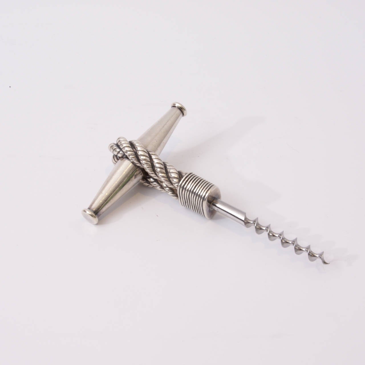 Silver plated bottle opener by Hermès.