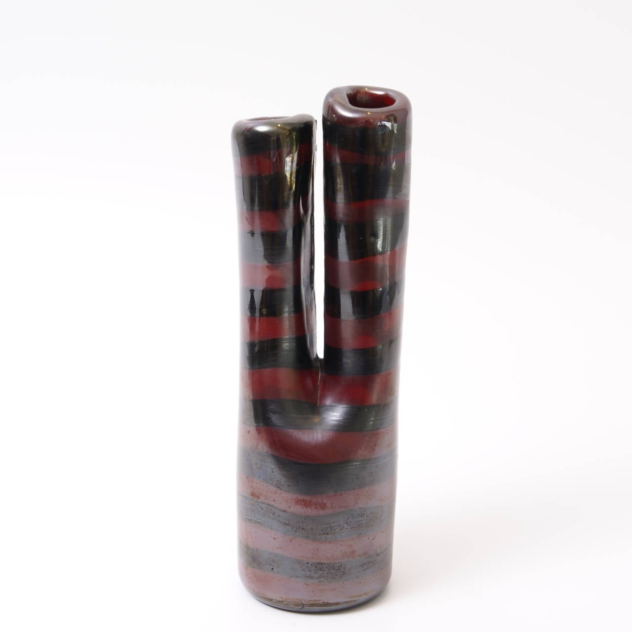 Rare two necks red and black glass a fasce orizontali vase designed by Filvio Bianconi (1915-1996), executed by Venini circa 1955. Three lines acid etched signature: Venini Murano Italia. A similar piece is exhibited at 