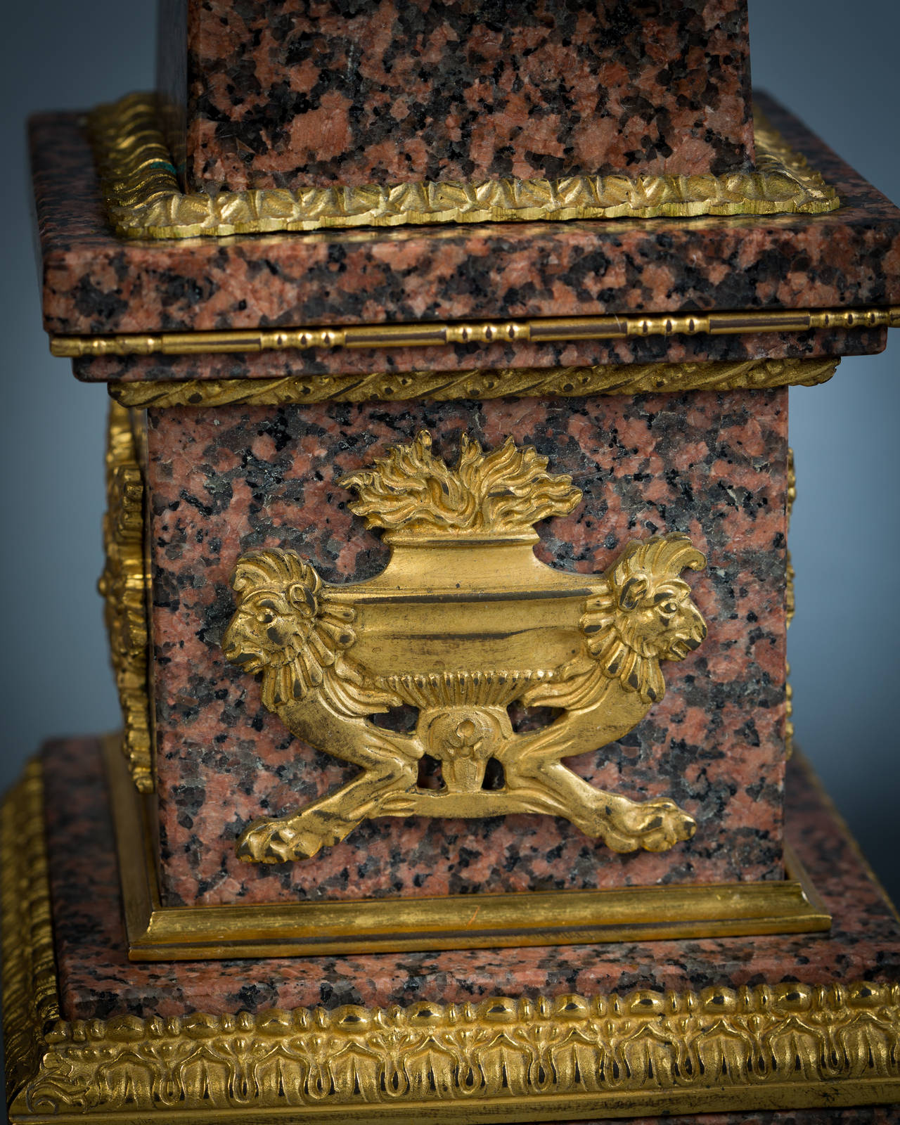 Pair of granite and bronze obelisks, late 19th century.