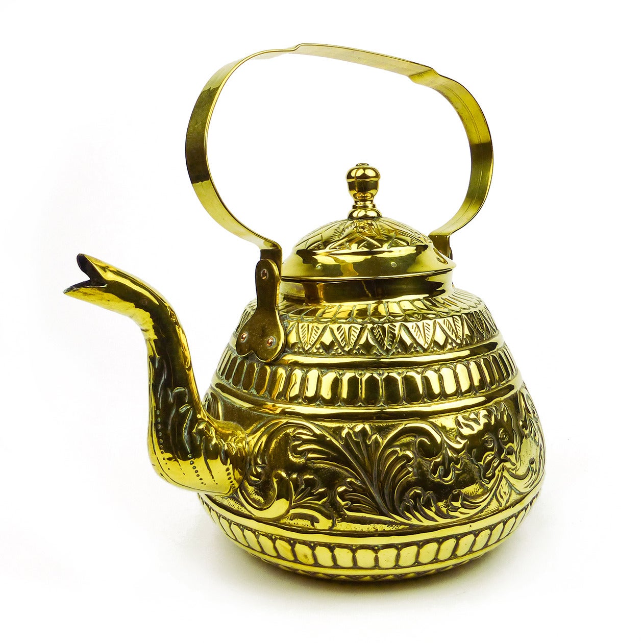 Dutch brass tea pot with swing handle and beautiful decoration, circa 1800
Perfect condition and could be used.
Measures: Diameter of body 8?, height including handle 11?.