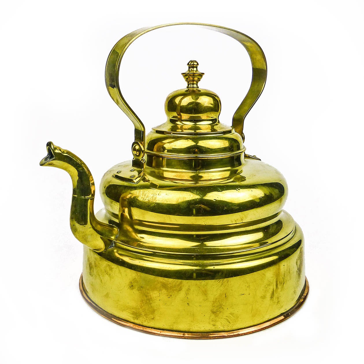 Dutch brass tea kettle, circa 1850

Cast spout. Copper bottom. Swing handle.

Measures: Height 11 1/2?, diameter 10 3/8?.