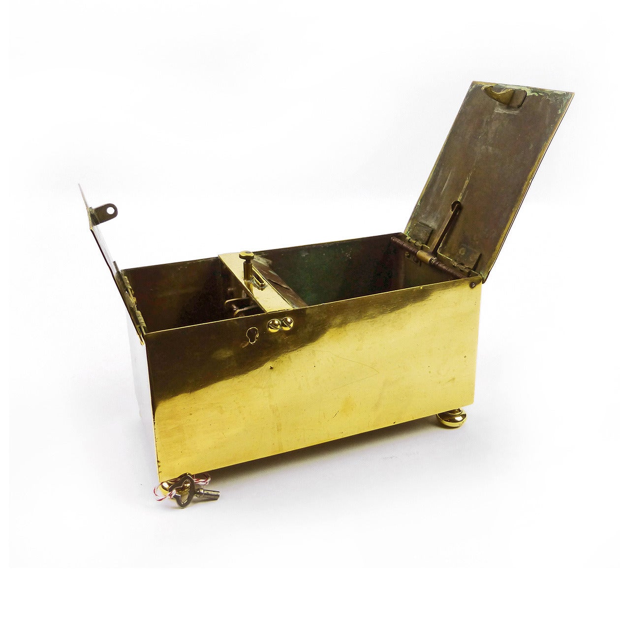 Fine English Brass “Honor” Tobacco Box Circa 1850

“A halfpenny dropped into the till,
Up springs the lid and you may fill;
When you have filled, without delay,
Shut down the lid or sixpence pay.”
 

In Working Order.

Length 9 3/8″, Width
