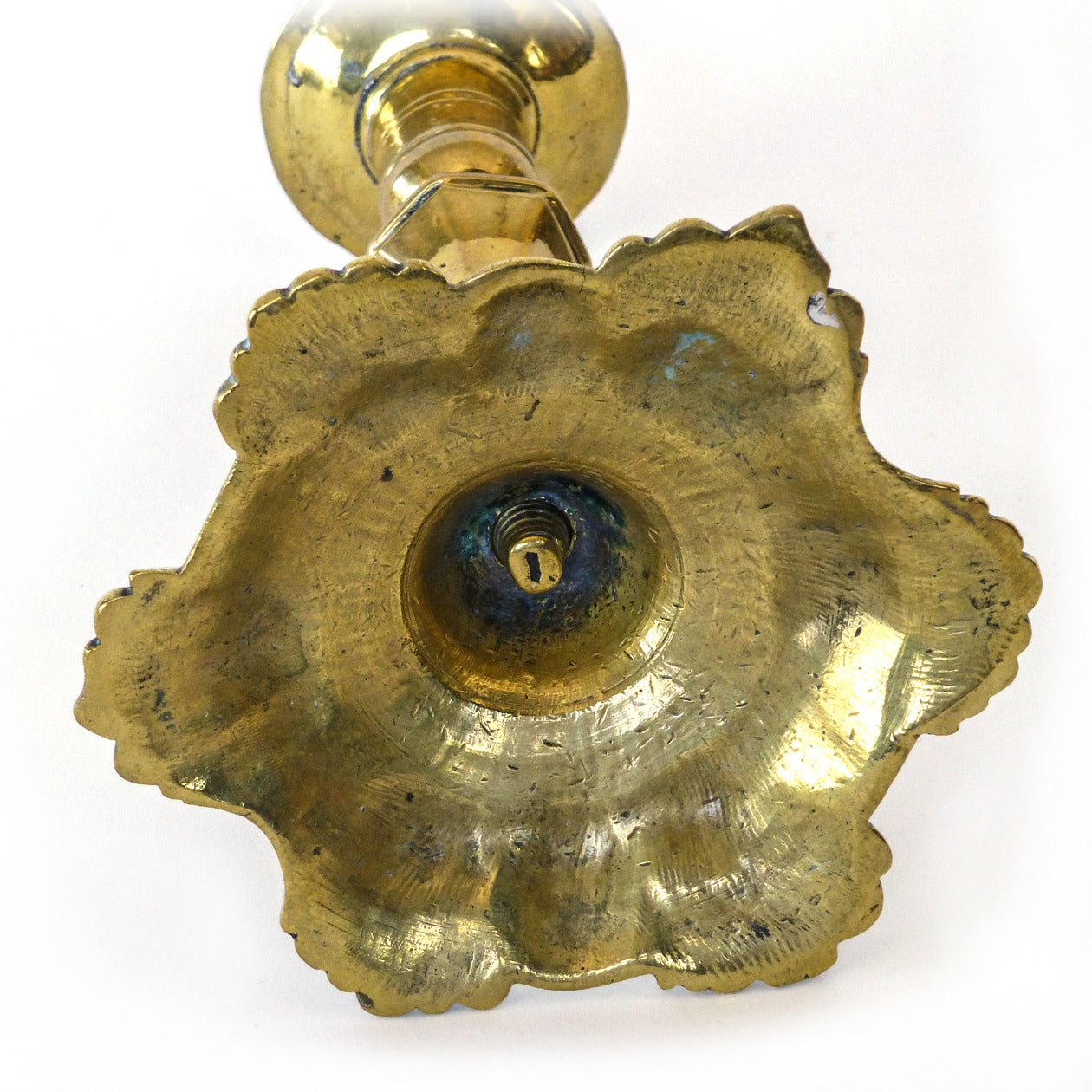 18th C. English/Dutch Brass Shell Base Candlestick Circa 1750
Great shell base. Unusual Construction. Shaft is core cast, screws into base. Bobeche sits on ledge, aperture spread to hold in place. 6 shells.
