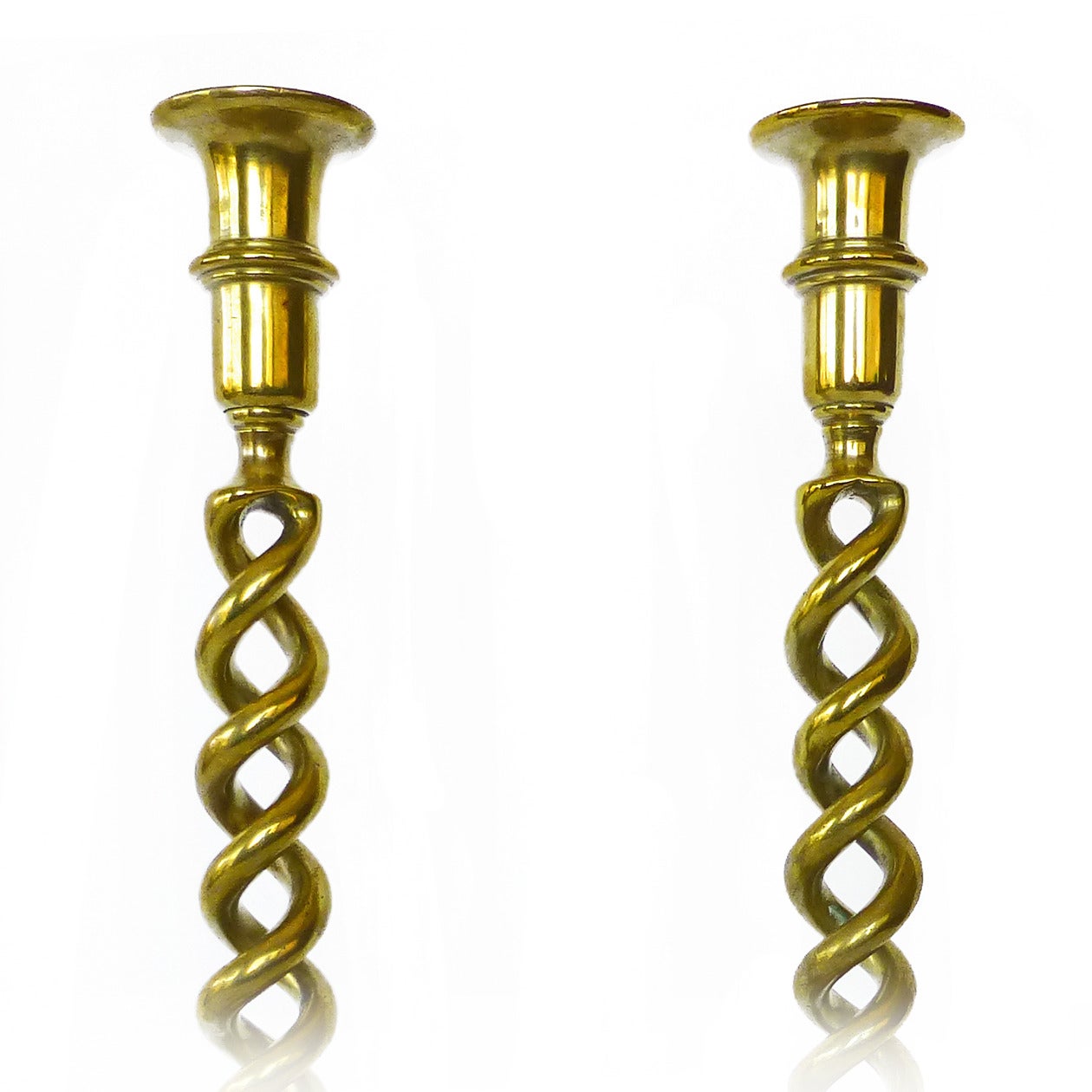 Pair of English Victorian Brass Double Twist Candlesticks Circa 1875

Height 15 1/2″, Base Diameter 5 1/2″