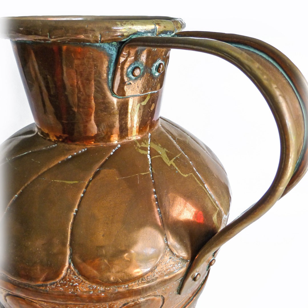 French Copper Wine Jug. Circa 1820. Dovetailed. Highly repousee decorated.

Height 15”

Width 8”

Diameter of Base 5 1/8”