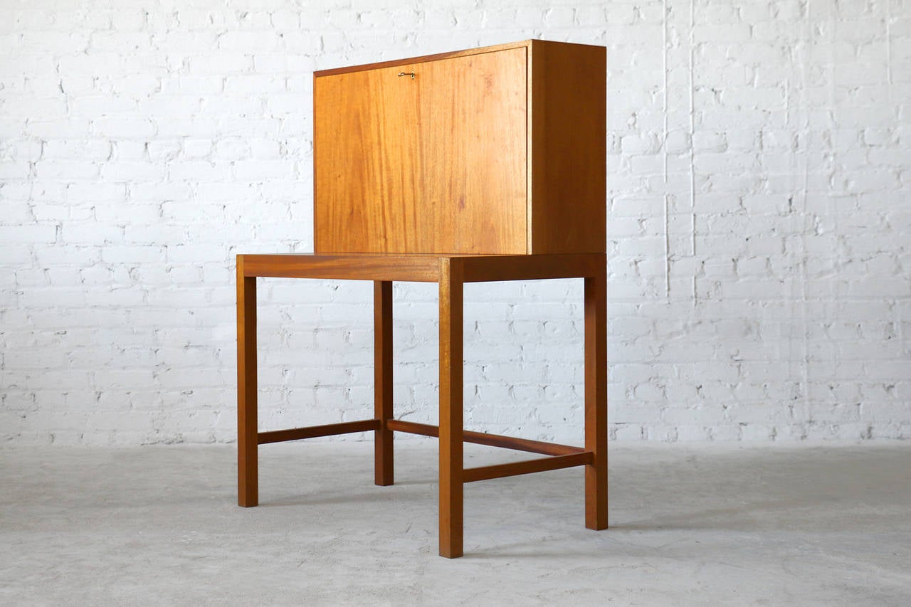 Designed in 1954.
Solid mahogany frame.
Seldom seen design.
Drop down work surface with storage.

A seldom seen vintage mahogany bureau/secretary by Nanna Ditzel for Danish manufacturer Kolds Savværk. This piece was originally designed for G.