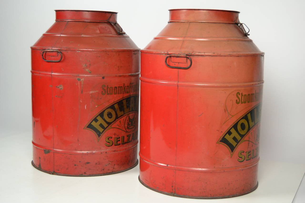 Two extra large Belgian red tole painted merchant stock boxes/containers of coffee beans. Were used for transport from wholesale to grocery store.

Still in very good condition with grab bars and shutdown. Bottoms also still perfect. Old spelling