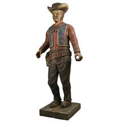 Vintage Hand-Carved Wooden Cowboy Sculpture