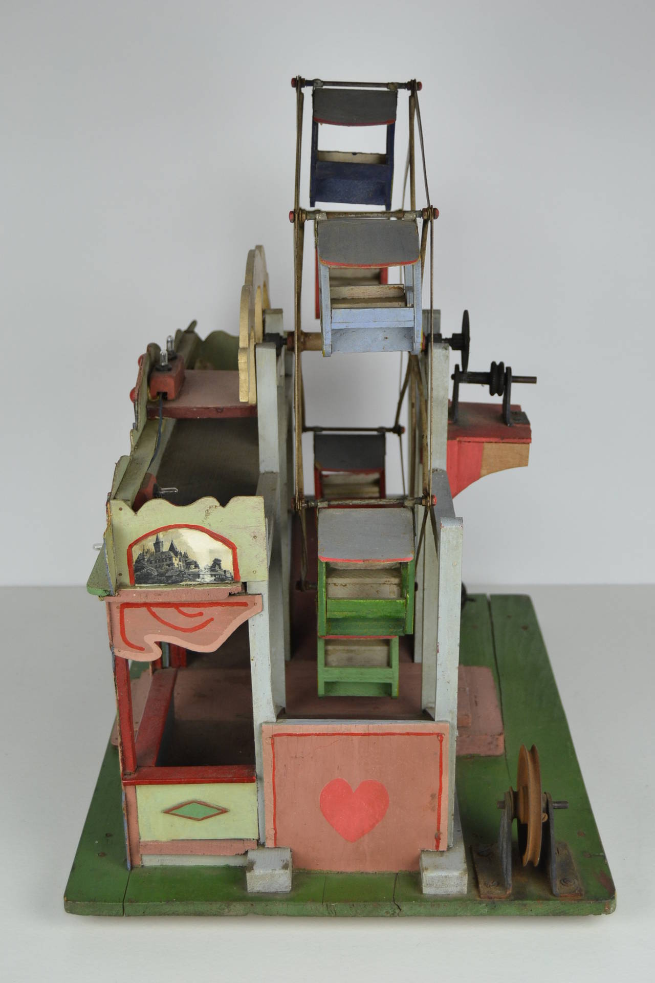 Hand-Crafted Folk Art Wooden Diecast of a Fairground and Giant Wheel