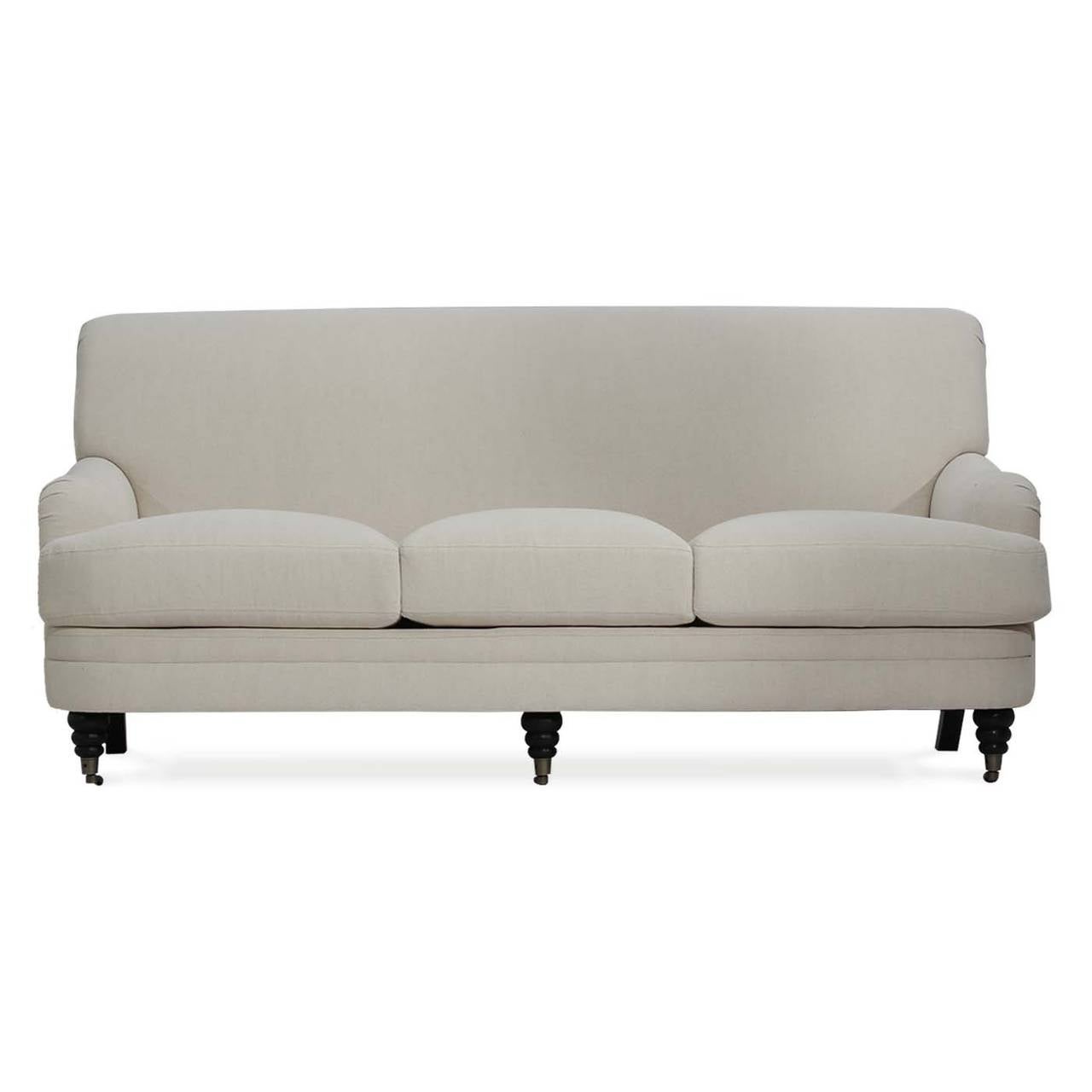 Pitti Sofa, solid wood frame, hand tied springs, cushions with innerspring wrapped with natural foam and feathers.
Finished in Black Open Grain, covered in Natural Linen Weave. 
Fully customizable and COM, available in standard finishes and