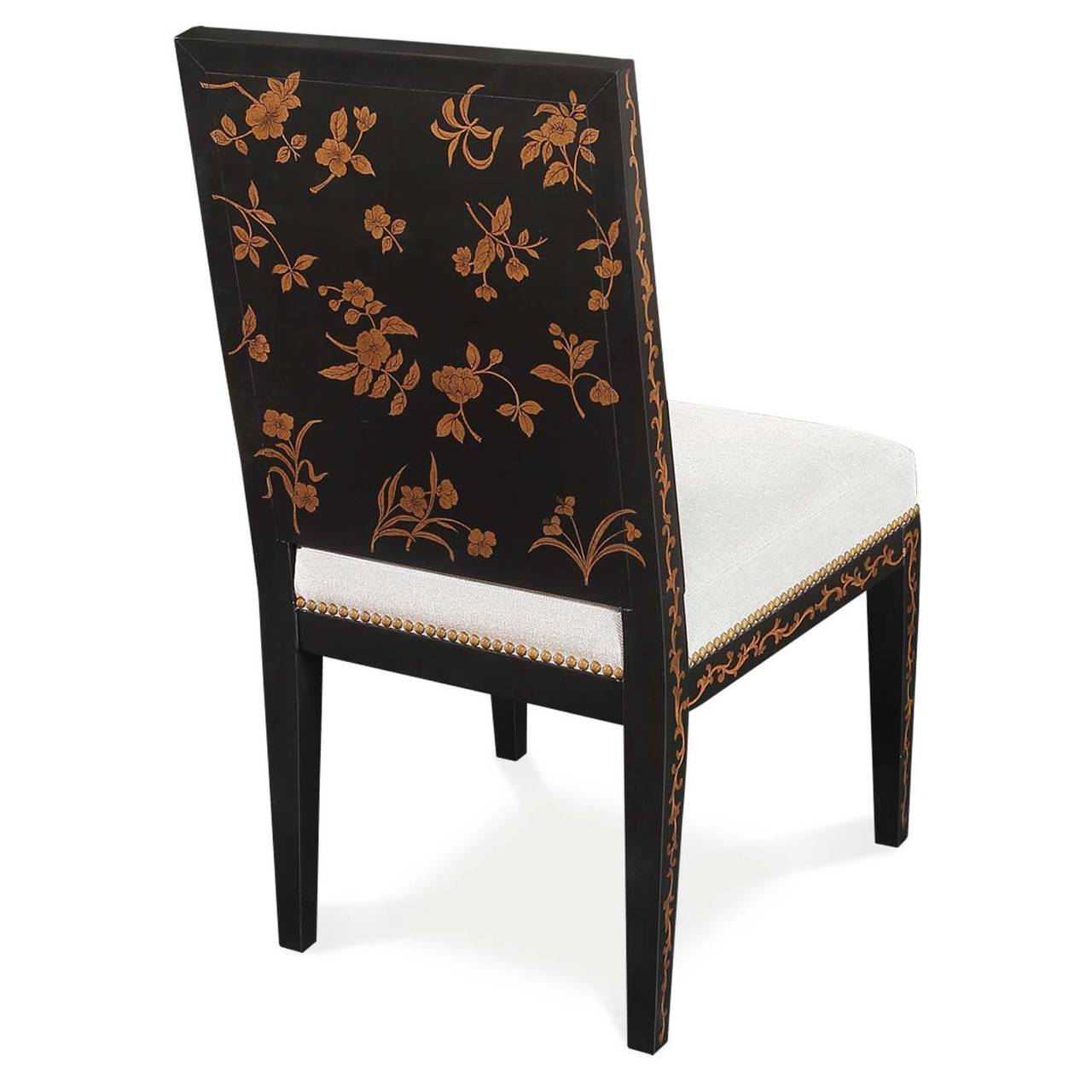 Handpainted by one of our best artist, this is a modern adaptation of an antique we found in Hong Kong. All of our Dining Chairs are hand crafted with tied straps and springs to insure comfort. Base colours can be changed to fit your decor, slight