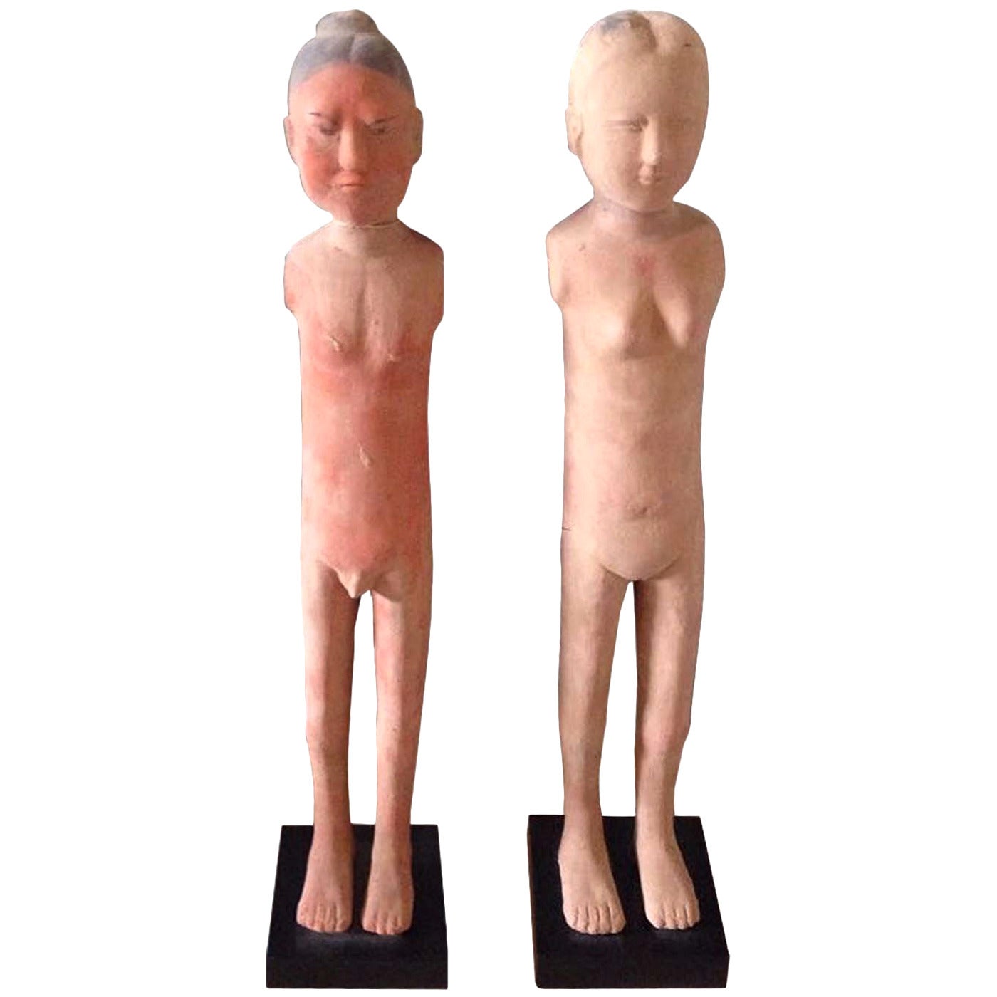 Pair of Han Dynasty Style Pottery Statues of a Man and Woman For Sale