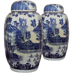 Pair of Blue and White Fluted Vases and Covers