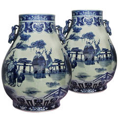 Pair of Blue and White Hu-Shape Vases with Deer Heads Handles