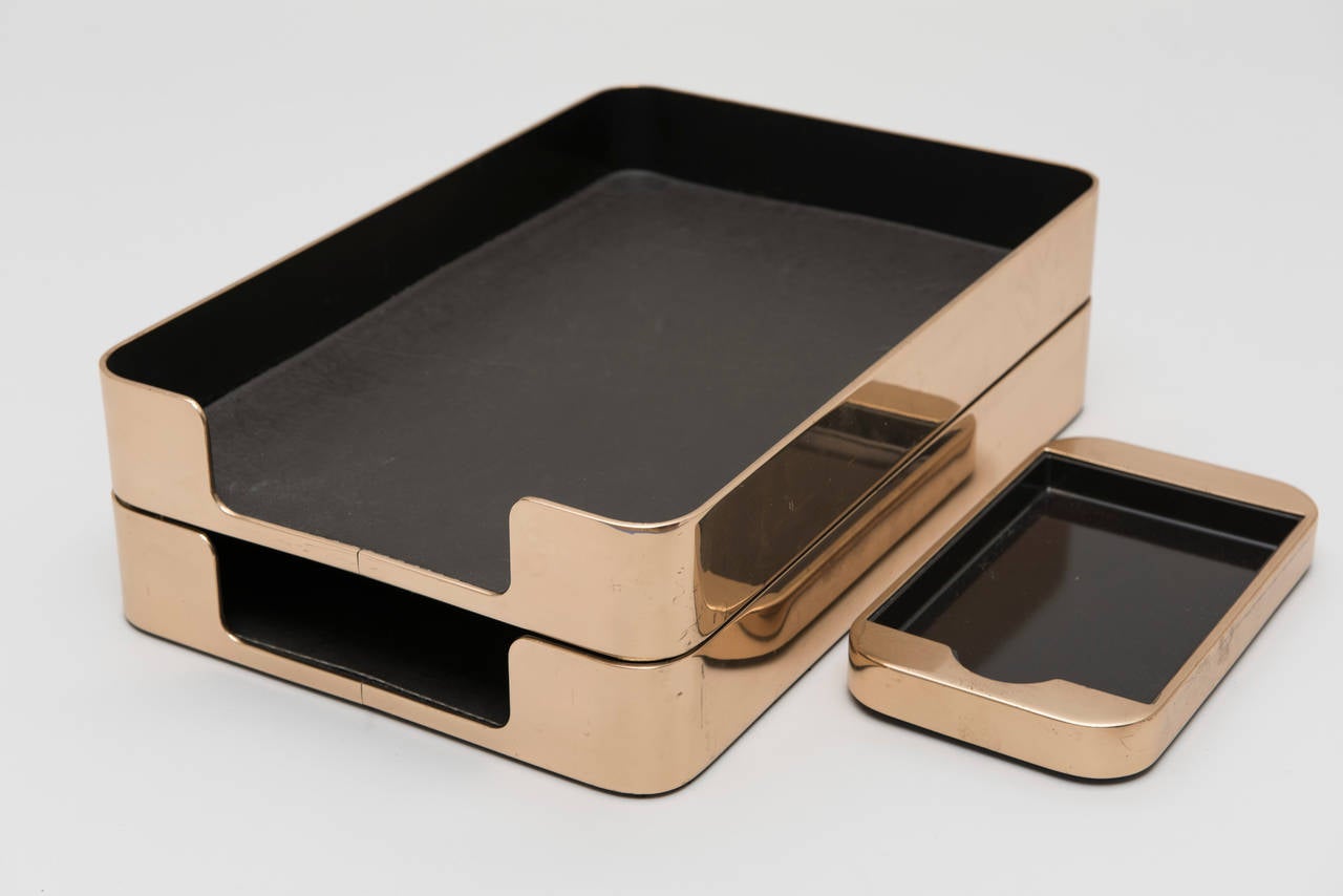 The award-winning Radius One collection, designed by William Sklaroff for Smith Metal Arts in 1965 is in the permanent collection of The Museum of Modern Art in New York. This is a pair of letter holders and a notepad holder made from high-polished