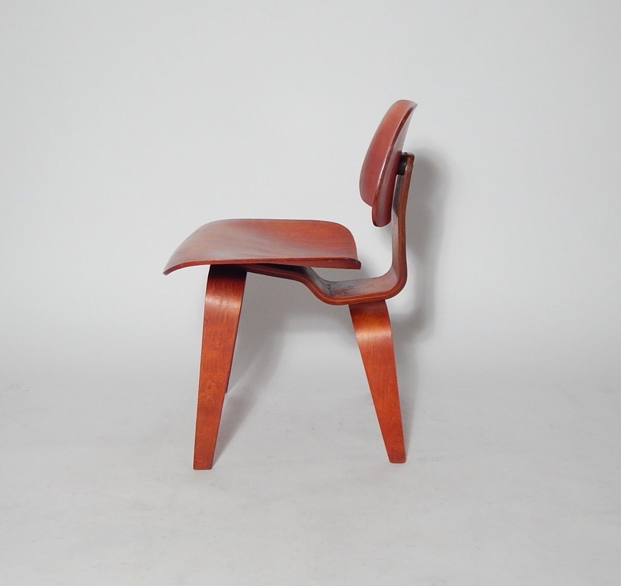 American Charles and Ray Eames DCW in Red Aniline, 1950s
