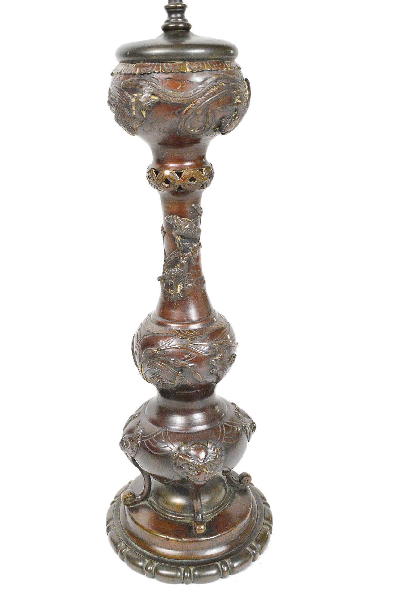 Japanese Meiji period bronze vase mounted as a lamp with bird and foliage decoration.
34