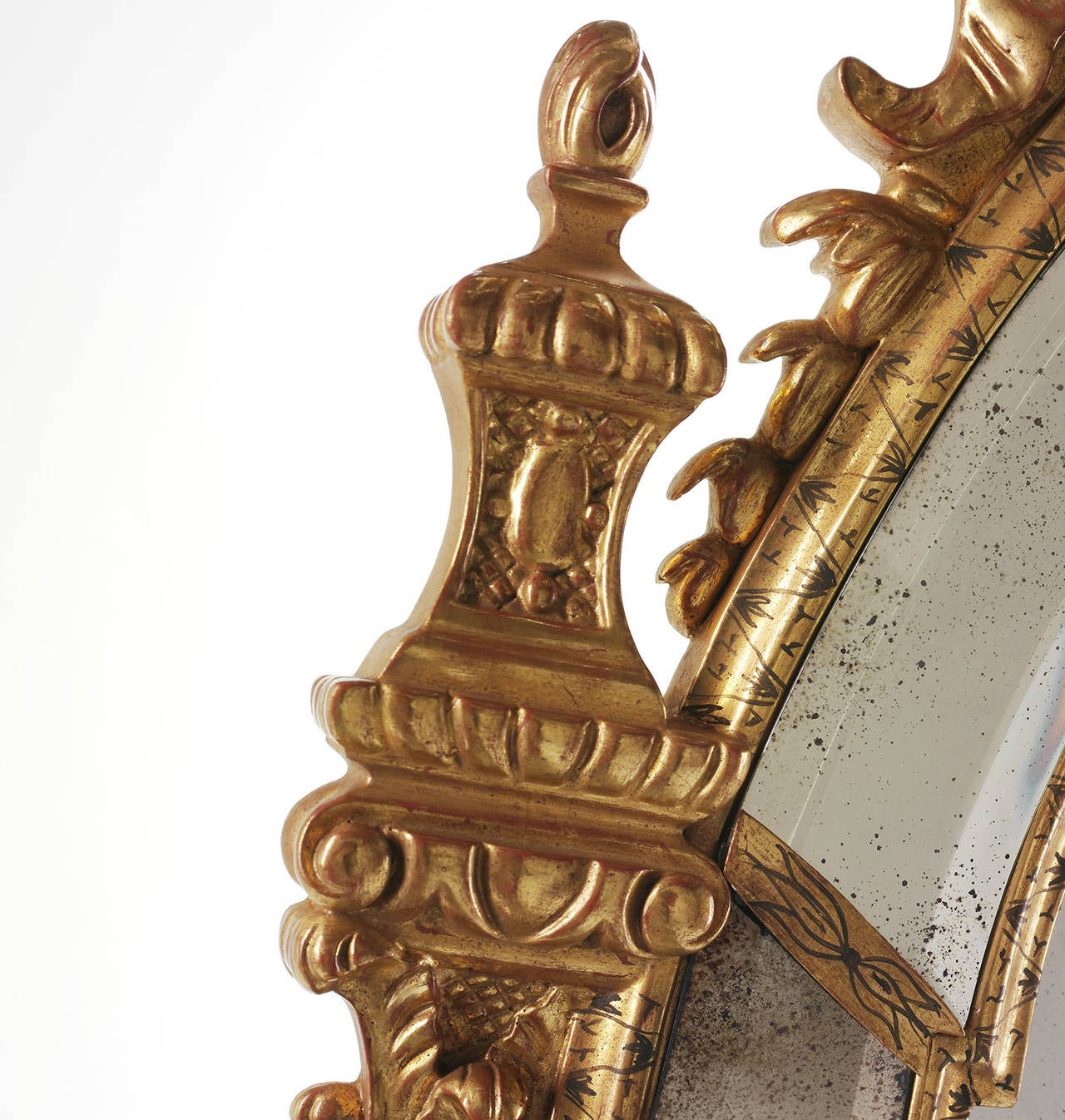 British Stately Homes Wakefield mirror with panels in gold and gold black trim
22-karat gold gilt finish with lightly antiqued mirrored borders, center panels in mirrored antique finish. Border pieces in bevel mirror.
Shaped beveled mirrored panel