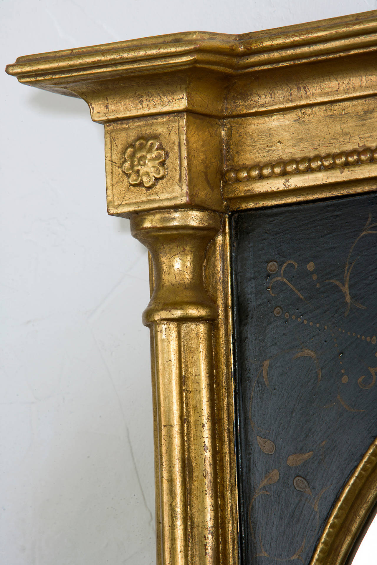 American Black and Gold Mirror with Bevel Over Man's Chest