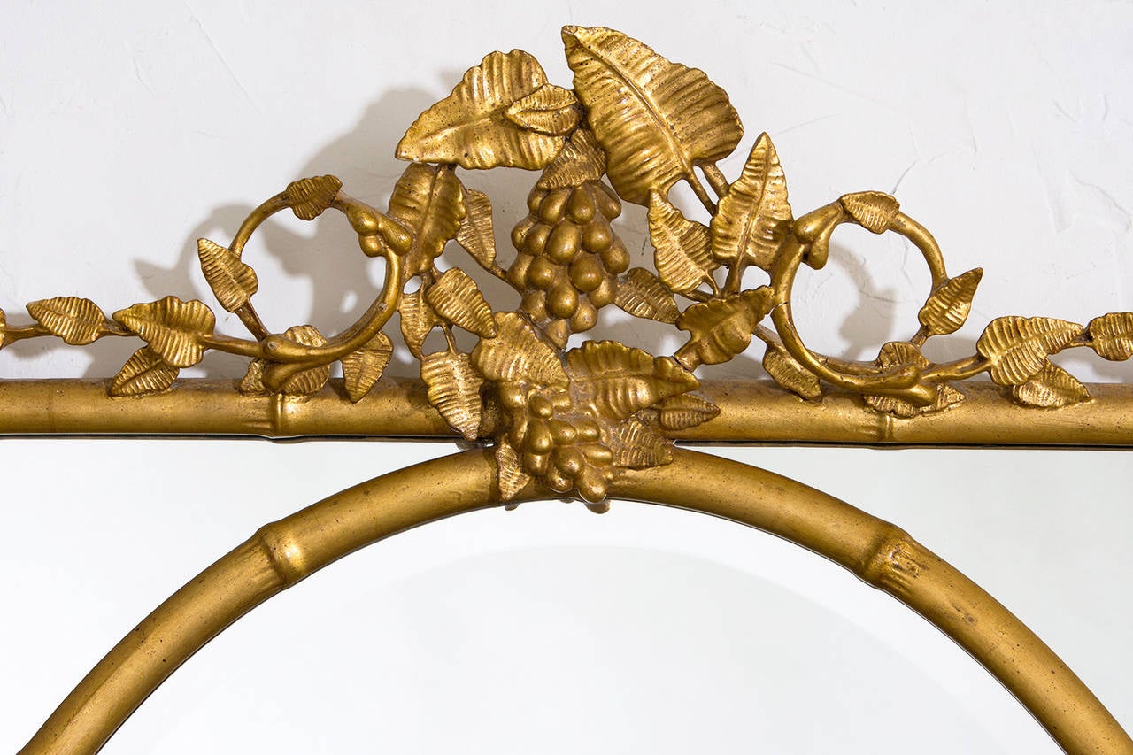 Gilt bamboo with oval center.
Size H 42 1/2